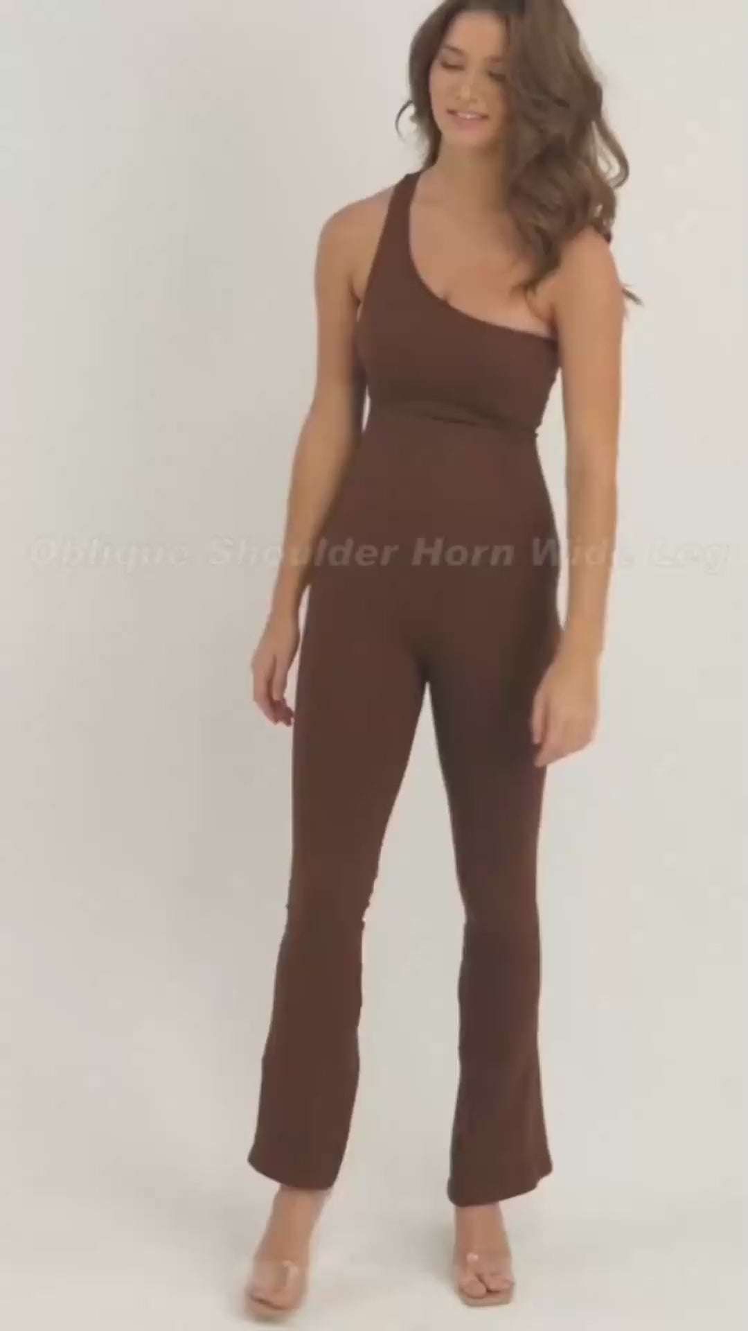 Sloped Shoulders Flared Jumpsuit