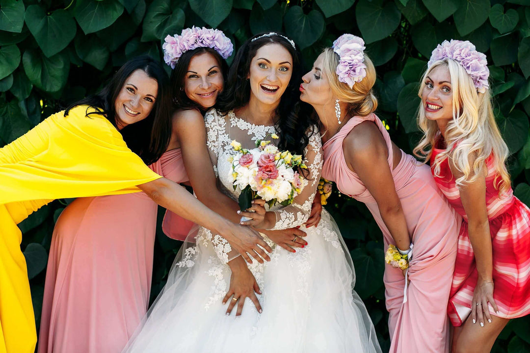 one piece bodysuit for weddings bridal party with elegant bridesmaids celebrating a joyful wedding portrait
