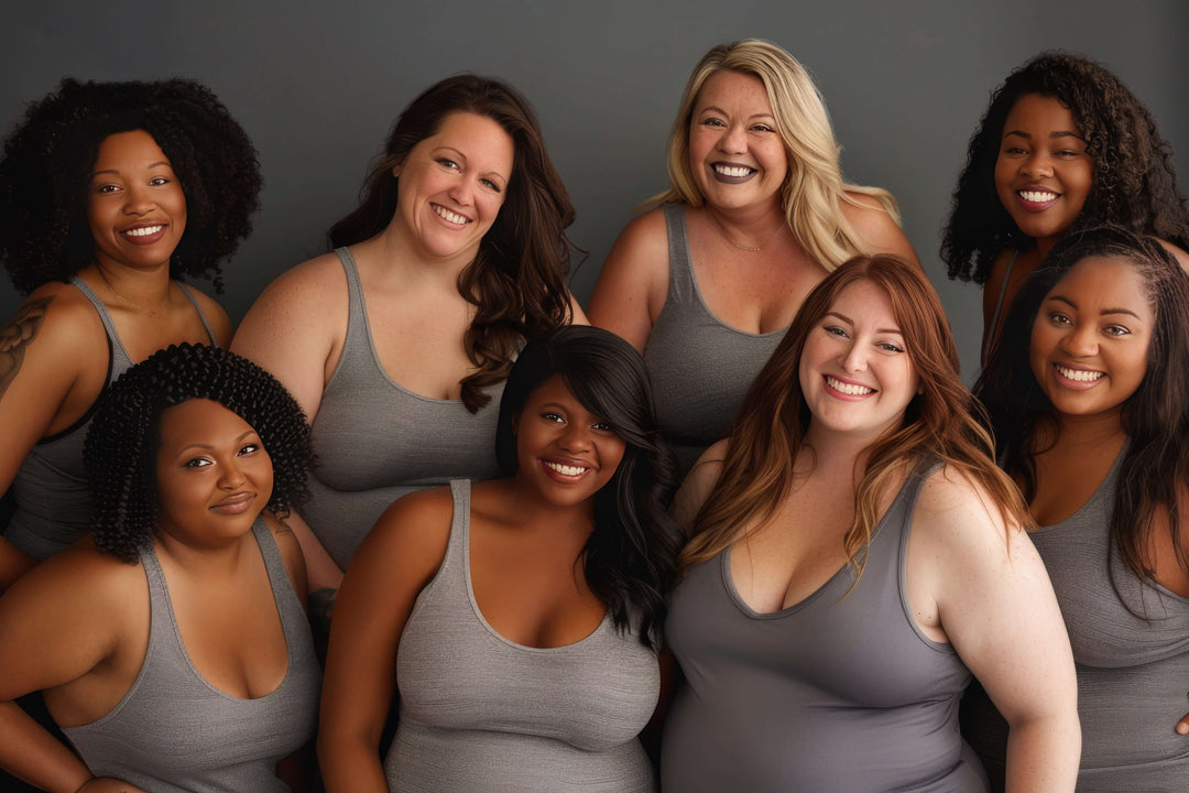 plus size summer wardrobe featuring diverse women in gray dresses and bodysuits smiling together