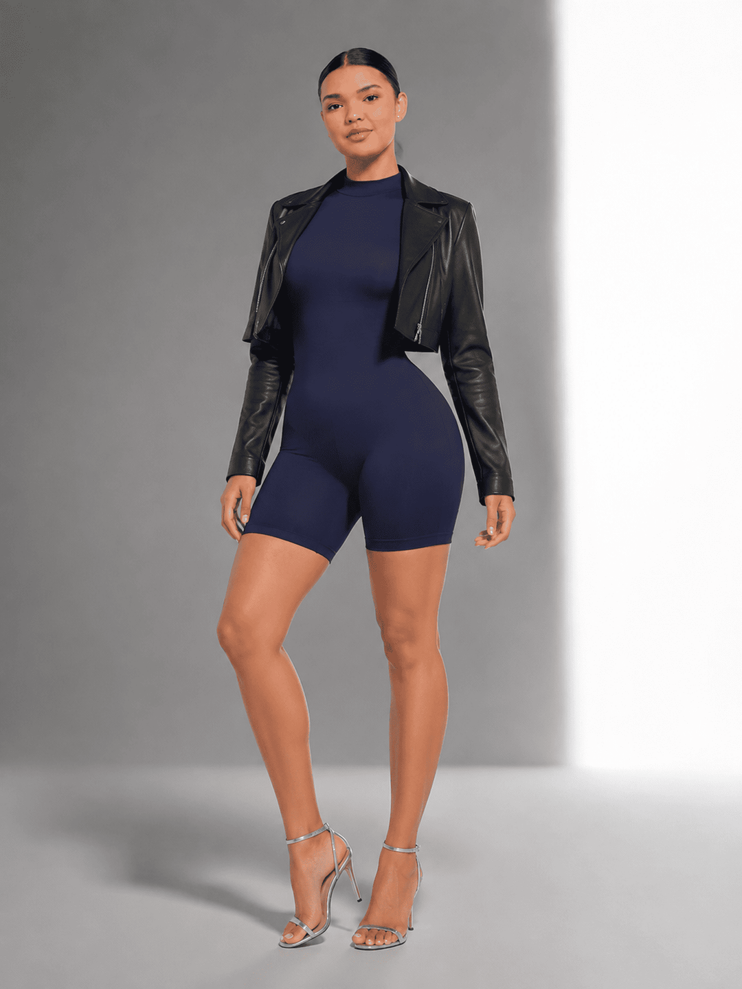 The short-leg sculpting jumpsuit built to move beyond one dress code.