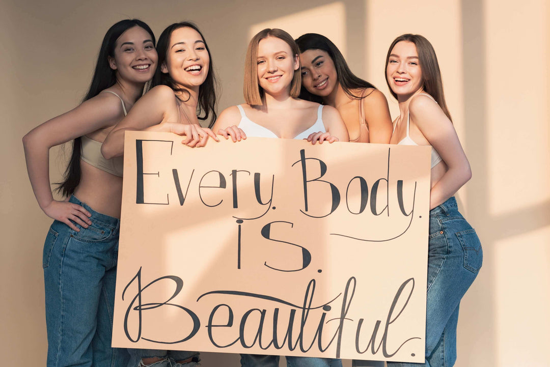 best shapewear bodysuits for a flawless figure, group of women holding an Every Body Is Beautiful sign