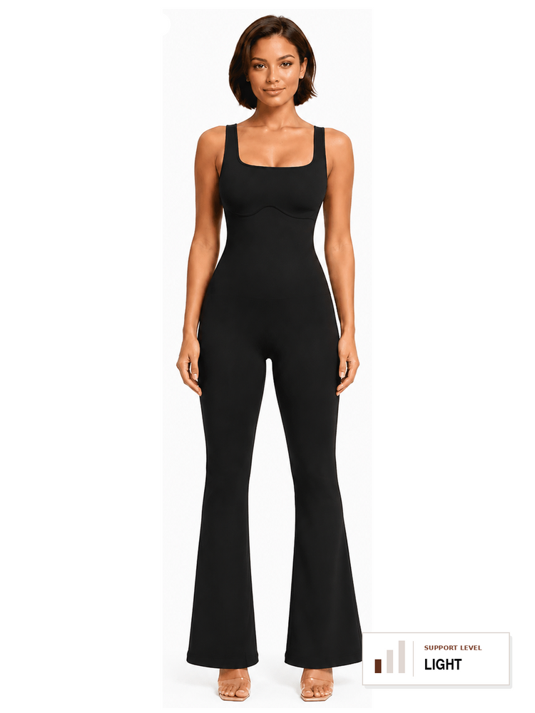 A woman modeling a black sleeveless jumpsuit with a square neckline and flared legs against a light gray studio background. Text at the top left reads 'SUGAR + SPICY' and 'SCULPTED FRAME,' and a small label at the bottom right says 'SUPPORT LEVEL LIGHT.