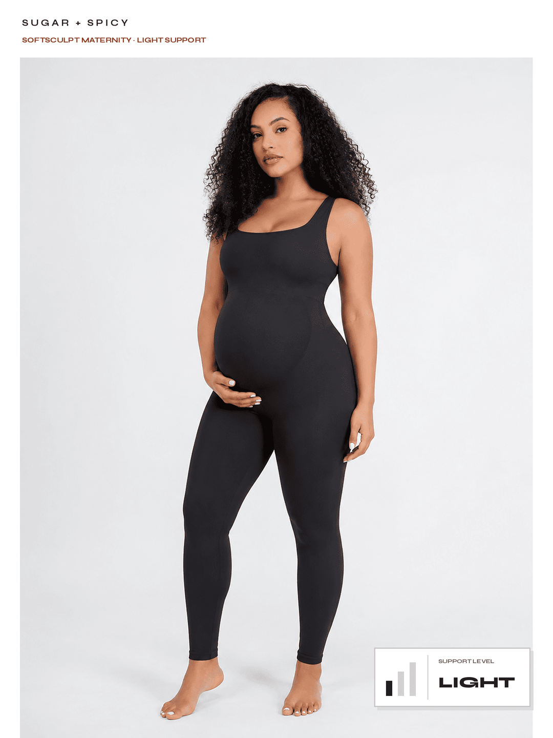 A pregnant model wearing a black maternity support bodysuit with integrated leggings, standing against a light gray background. The image includes text overlays reading 'SUGAR + SPICY' and 'SOFTSCULPT MATERNITY, LIGHT SUPPORT' along with a support level graphic in the bottom right corner.