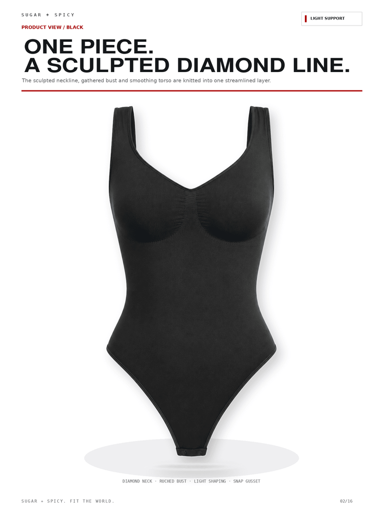A black one-piece bodysuit with a scoop neck and wide shoulder straps, shown on a white background with promotional text above reading 'ONE PIECE. A SCULPTED DIAMOND LINE.