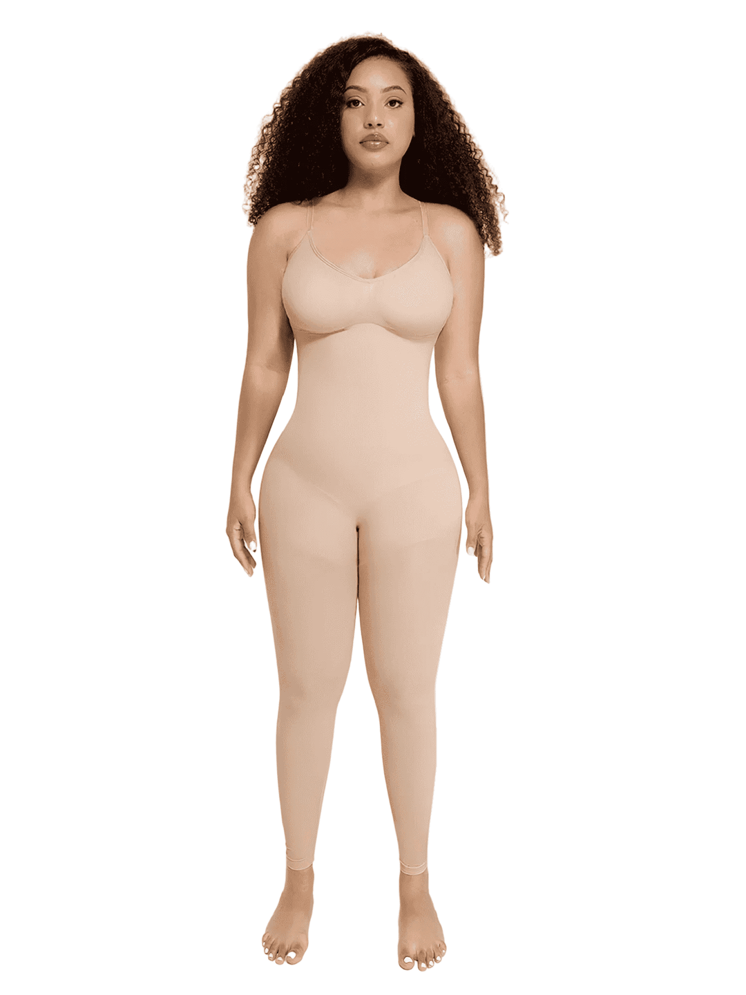 A woman modeling a full-body nude/beige shapewear bodysuit against a plain white background.