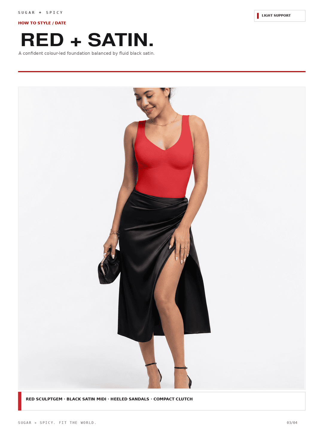 A model wears a red sleeveless bodysuit paired with a black satin midi skirt with a thigh-high slit, holding a small black clutch against a clean white background.