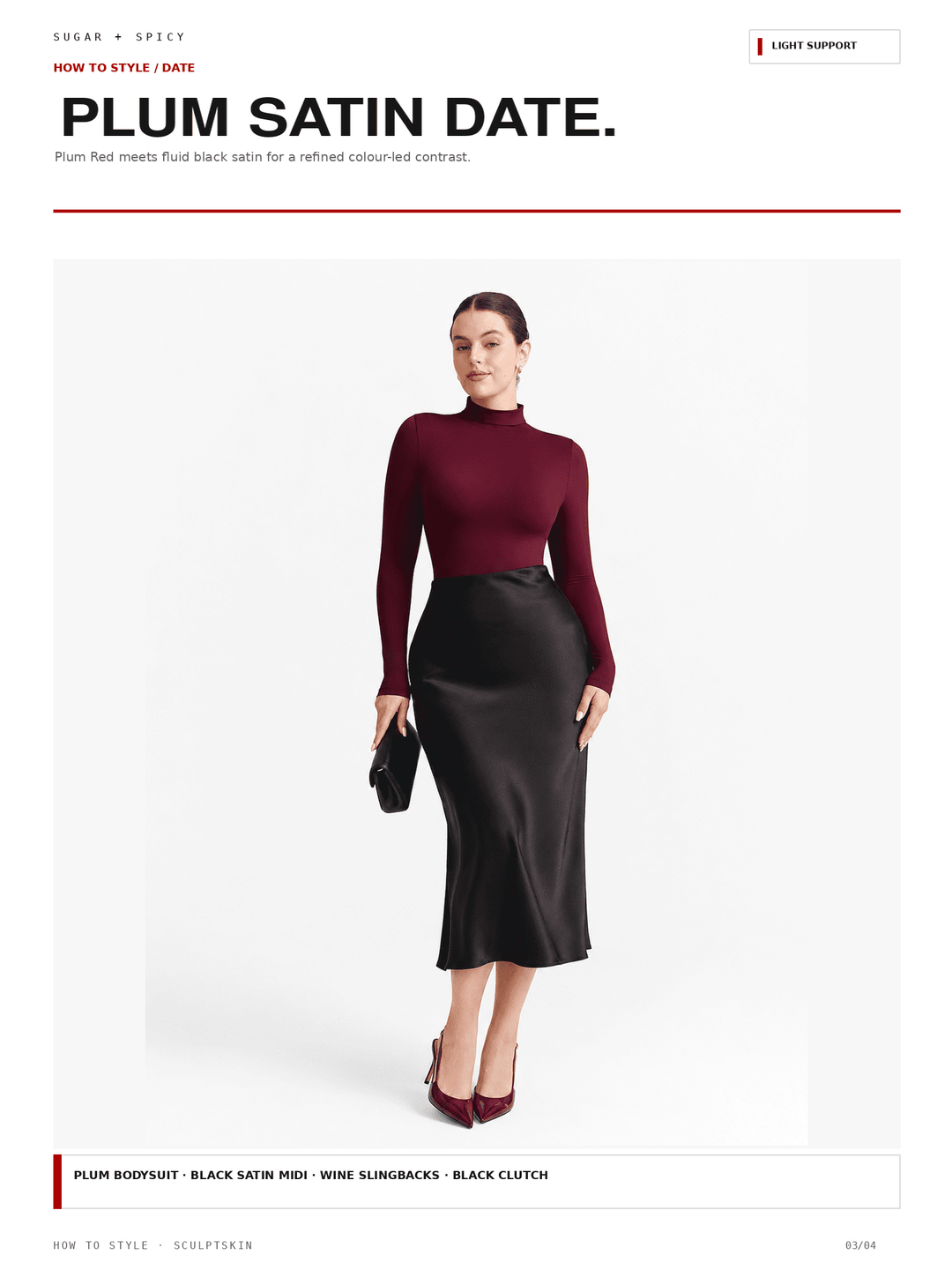 A fashion editorial-style product image showing a woman modeling a plum red satin date night outfit consisting of a long-sleeve mock neck top and a black satin midi skirt, against a clean white background.