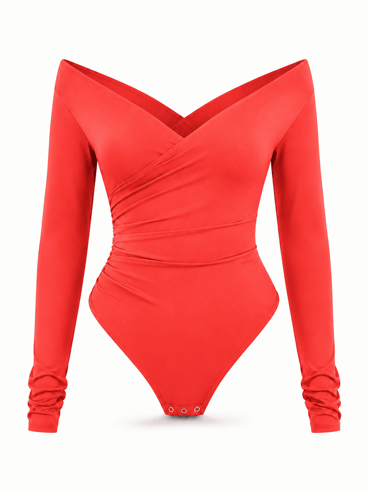 A bright red long-sleeve bodysuit with a dramatic off-the-shoulder wrap-style neckline, ruched waist, and three snap buttons at the crotch, shown on a plain white background.