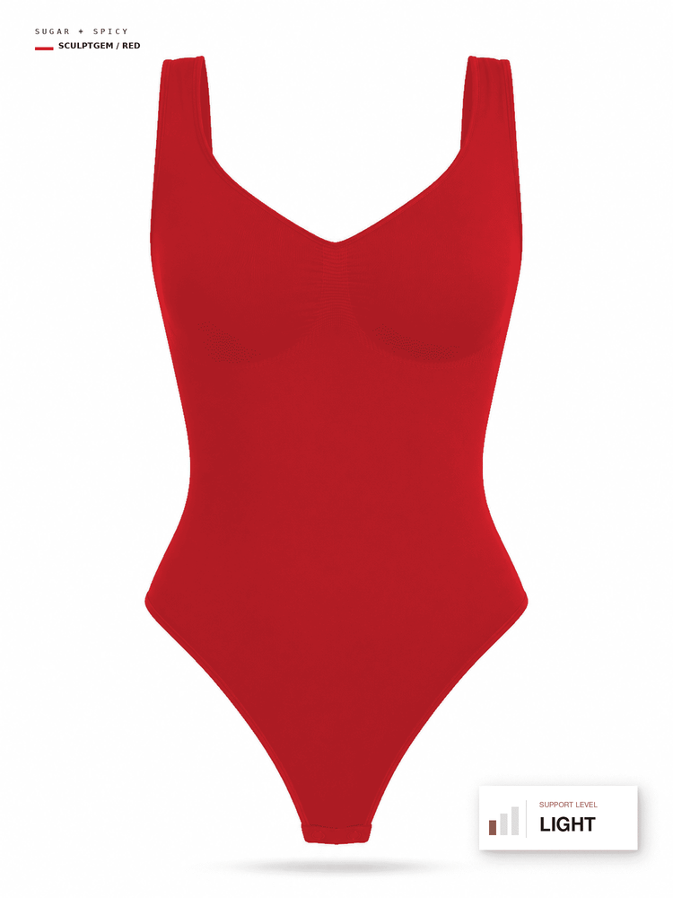 A red one-piece bodysuit or shapewear garment shown flat against a white background, with small text labels indicating color and support level.