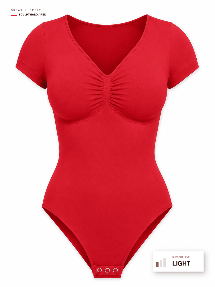 A bright red short-sleeve bodysuit with a ruched V-neckline, displayed on a clean white background with informational text overlays.