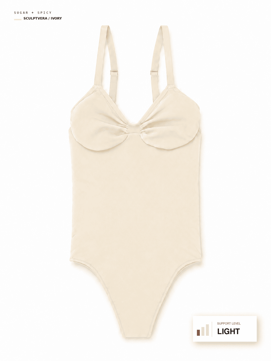 A light beige sculptural bodysuit with shoulder straps and a decorative bow at the bust, shown flat against a white background with small text labels.
