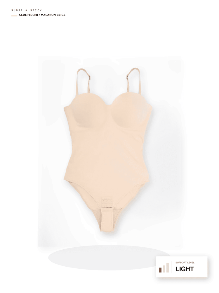 A nude-beige molded bodysuit with underwire cups and thin shoulder straps, shown on a clean white background with small text labels at the top left and a support-level badge at the bottom right.
