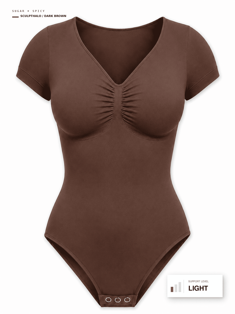 A dark brown short-sleeve bodysuit with a V-neckline and gathered bust detail, shown on a plain white background with small text labels in the corners.