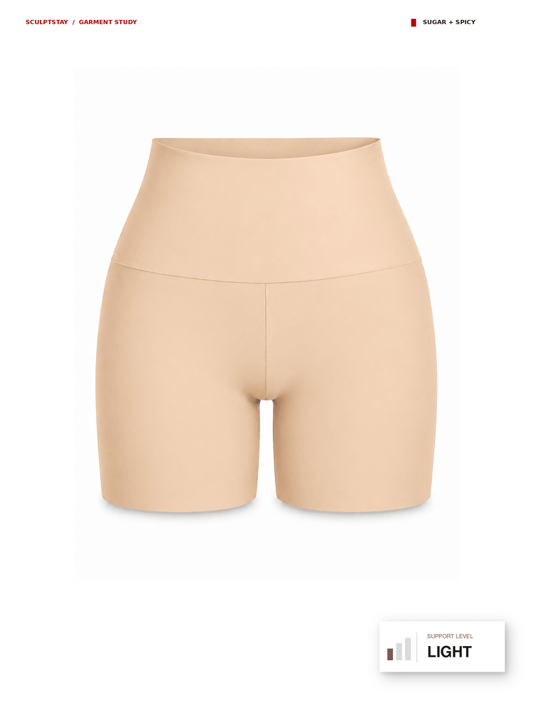 A pair of high-waisted seamless support shorts in a soft nude color, shown on a clean white background with product information text and a support level badge.