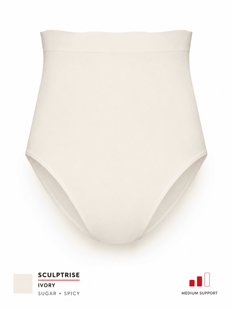 An ivory high-waisted brief or shapewear garment shown alone on a white background, with text at the bottom reading 'SCULPTRISE IVORY SUGAR + SPICY' and a small red support icon.