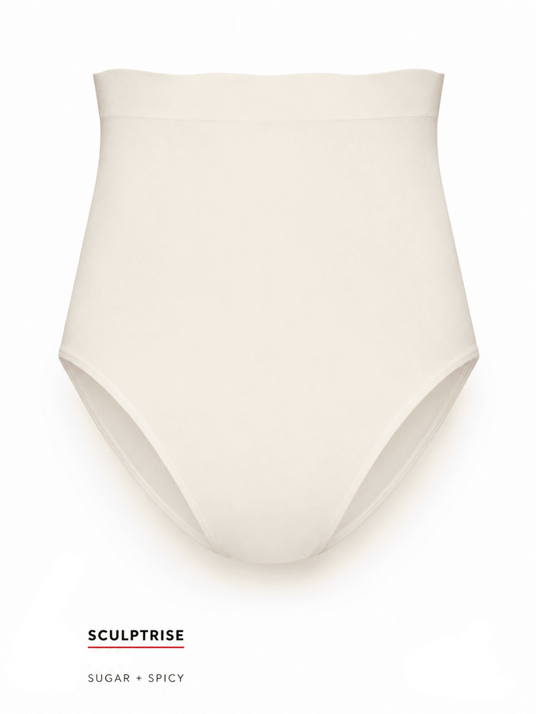 An ivory high-waisted brief or shapewear garment shown alone on a white background, with text at the bottom reading 'SCULPTRISE IVORY SUGAR + SPICY' and a small red support icon.
