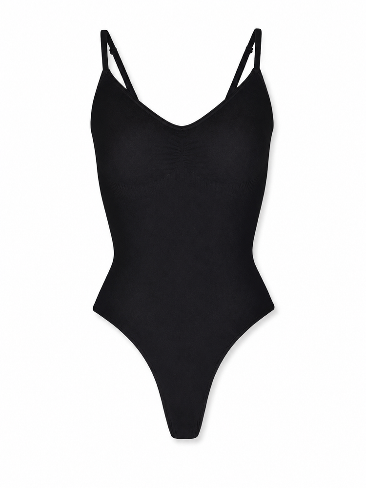 A black one-piece bodysuit with thin double shoulder straps and a V-neckline, displayed against a solid white background.