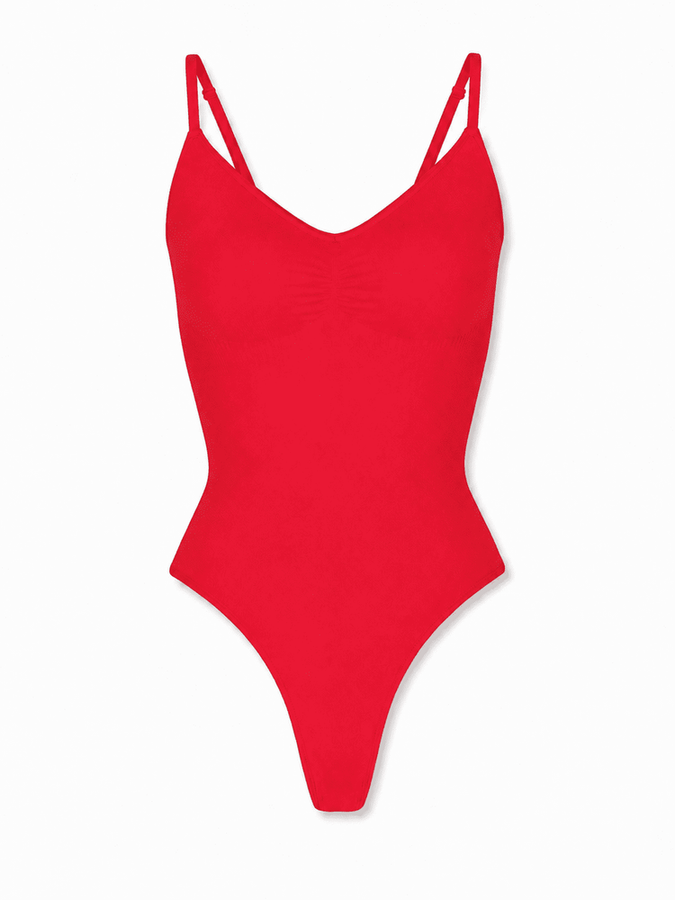 A bright red one-piece swimsuit with thin double shoulder straps and a V-neckline, shown flat against a plain white background.