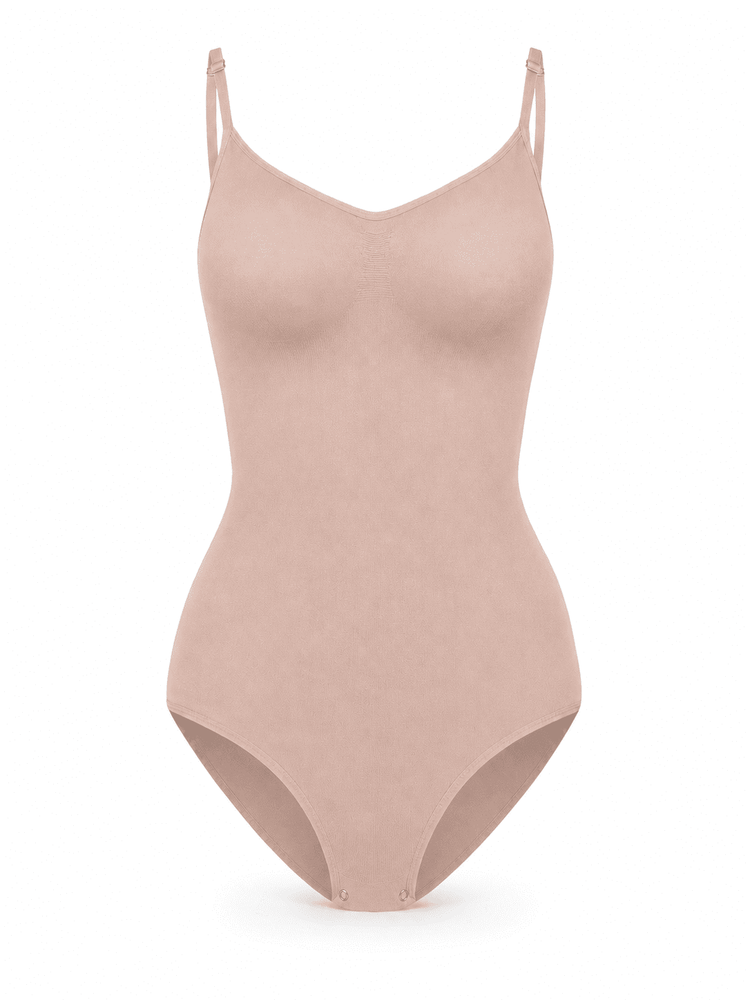Bare Sculpt Seamless Thong Bodysuit in soft nude color, designed for comfort and a smooth silhouette.