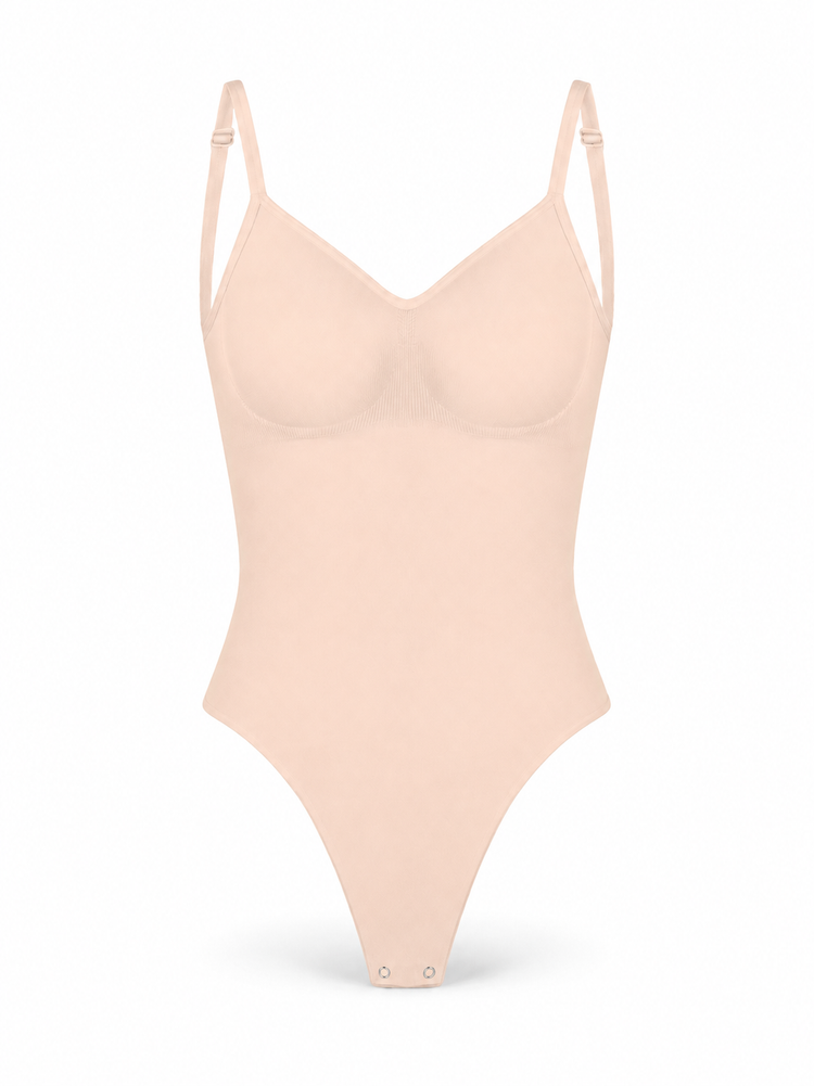 OpenSculpt Seamless Low-Back Thong Bodysuit in light nude color, ideal for a smooth silhouette and low-back outfits.