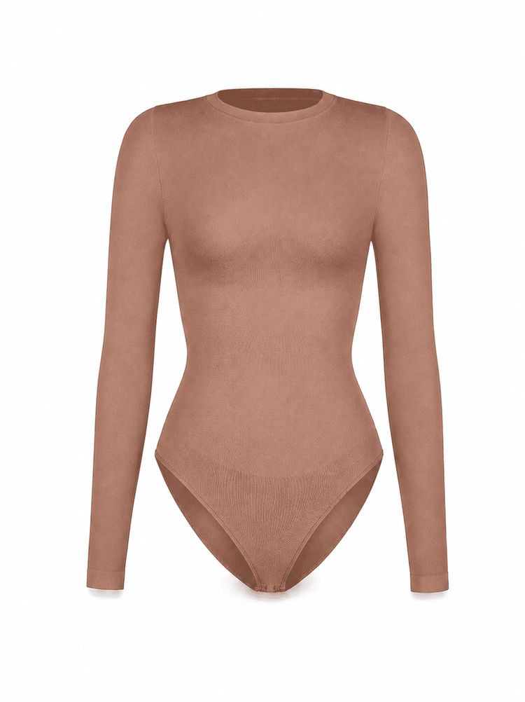 BodySculpt seamless long sleeve bodysuit in a light brown shade with a crew neckline and long sleeves.