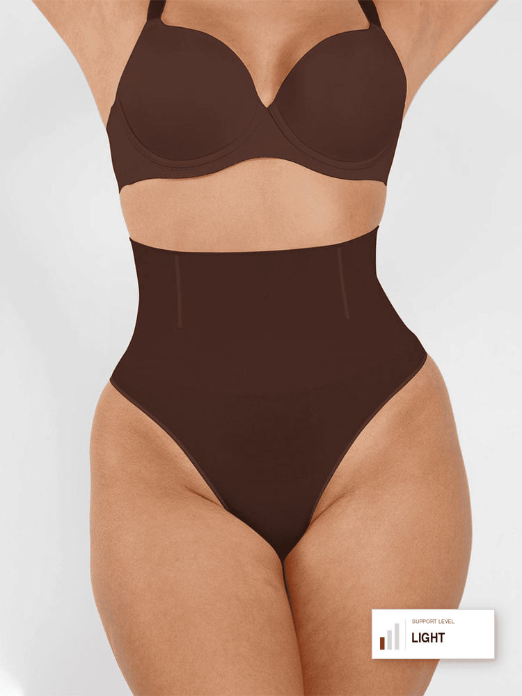 A model wearing a dark brown high-waisted shapewear brief and matching bralette set against a light gray background. A small label in the bottom right corner reads 'SUPPORT LEVEL LIGHT'.