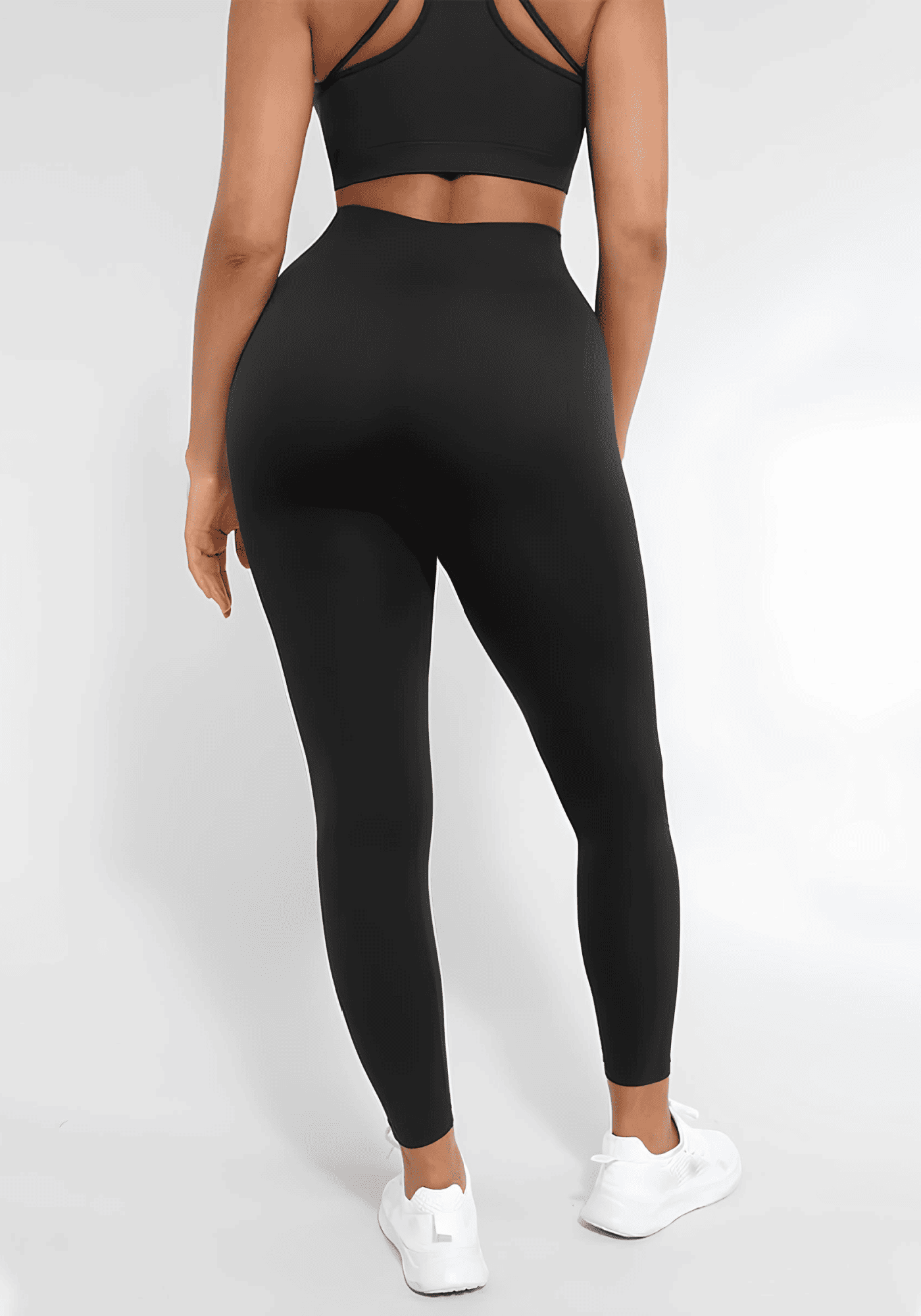 Body shaping leggings with high-waist seamless fit, sculpting curves and elongating legs, shown on model in black