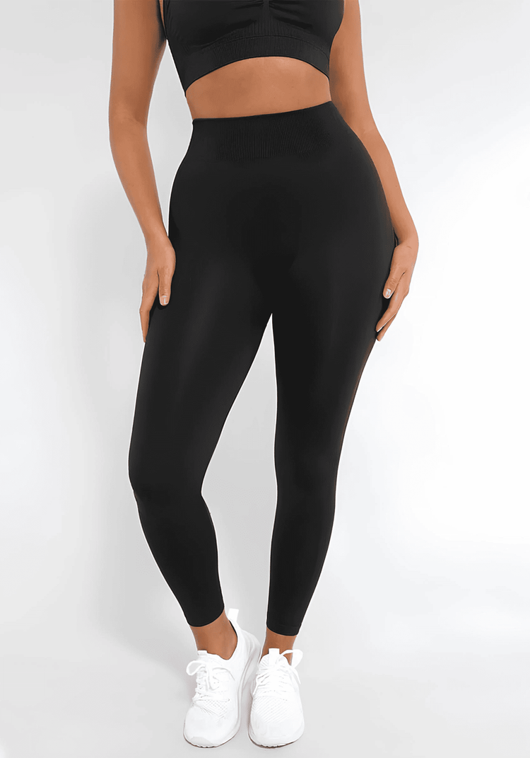 body shaping leggings on a model, high-waisted seamless black leggings for curve-enhancing support and a slim silhouette YD240011