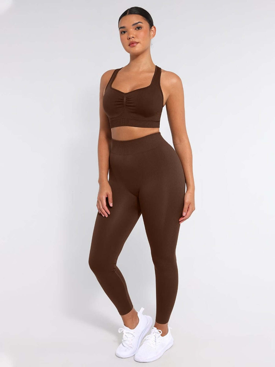 Body shaping leggings with seamless high-elastic waistband, contouring fit, and slim leg silhouette for confident everyday wear