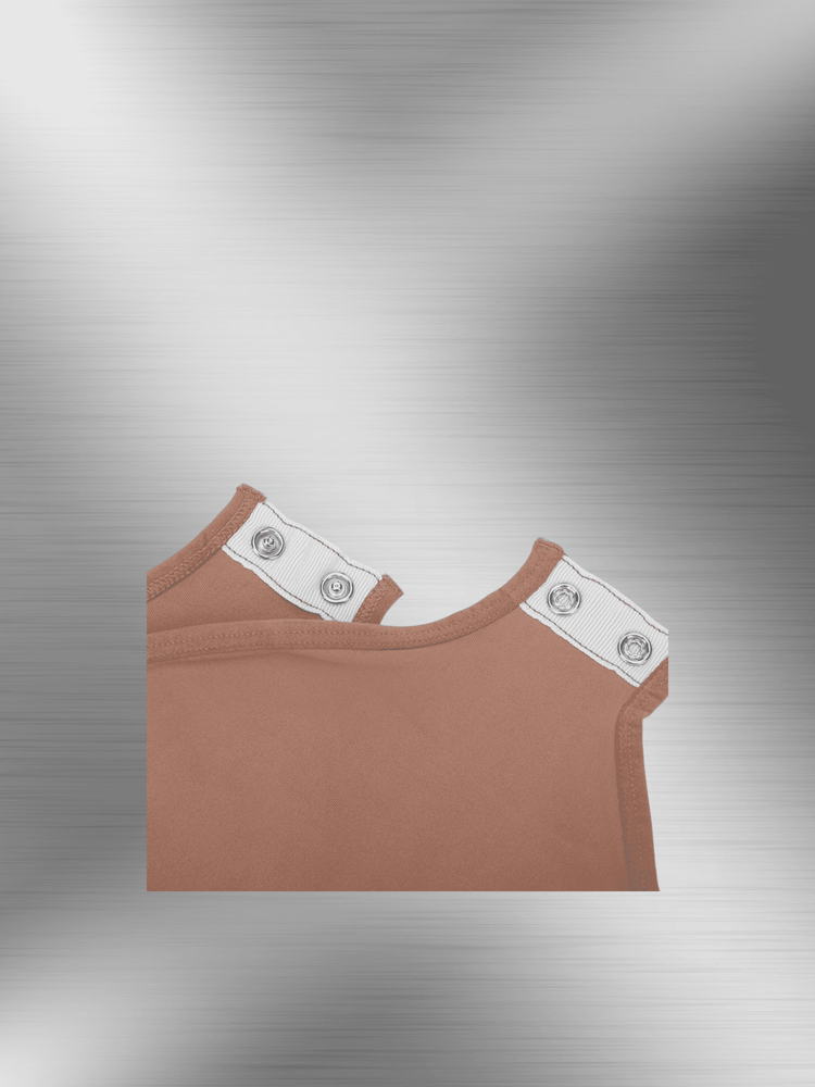 Seamless long sleeve bodysuit in brown with snap shoulder detail, lightweight smoothing fit and crew neck style