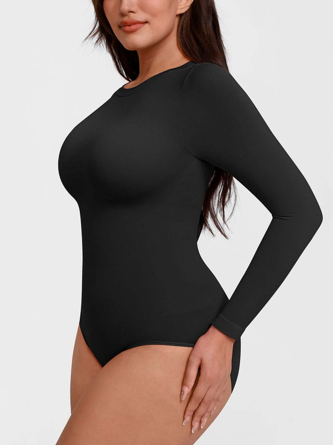 Black seamless long sleeve bodysuit with crew neck and tummy control for a smooth, sculpted fit