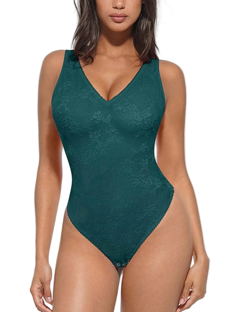 Green lace bodysuit worn by a model on a white background