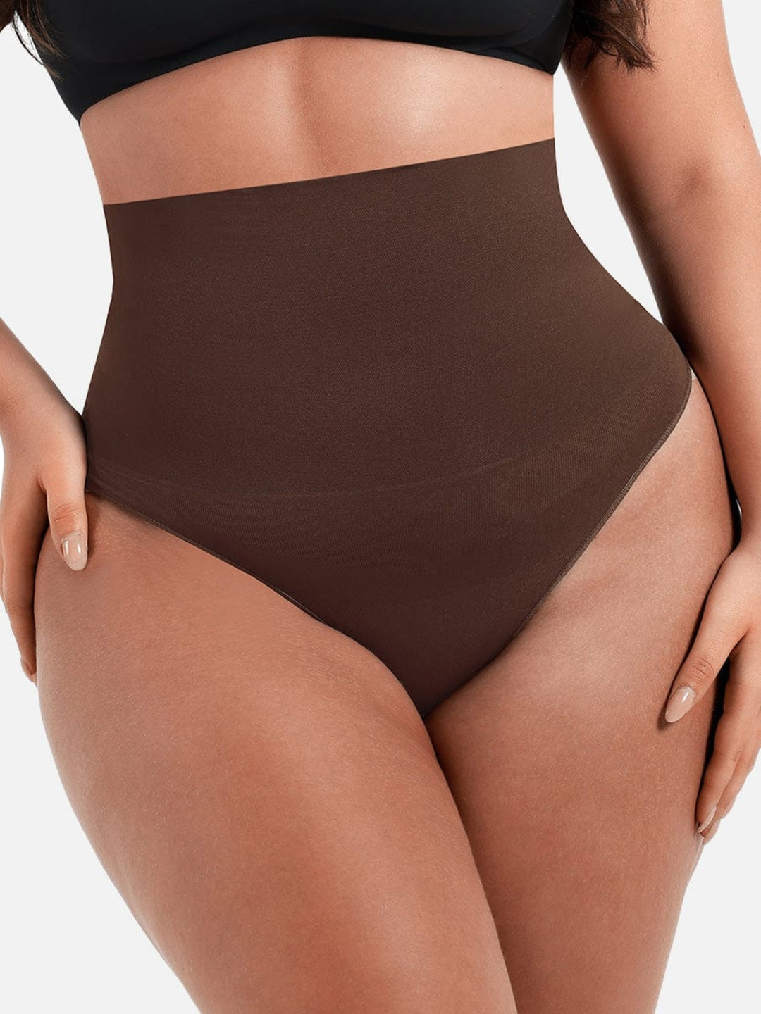 Brown high-waisted shapewear on a neutral background