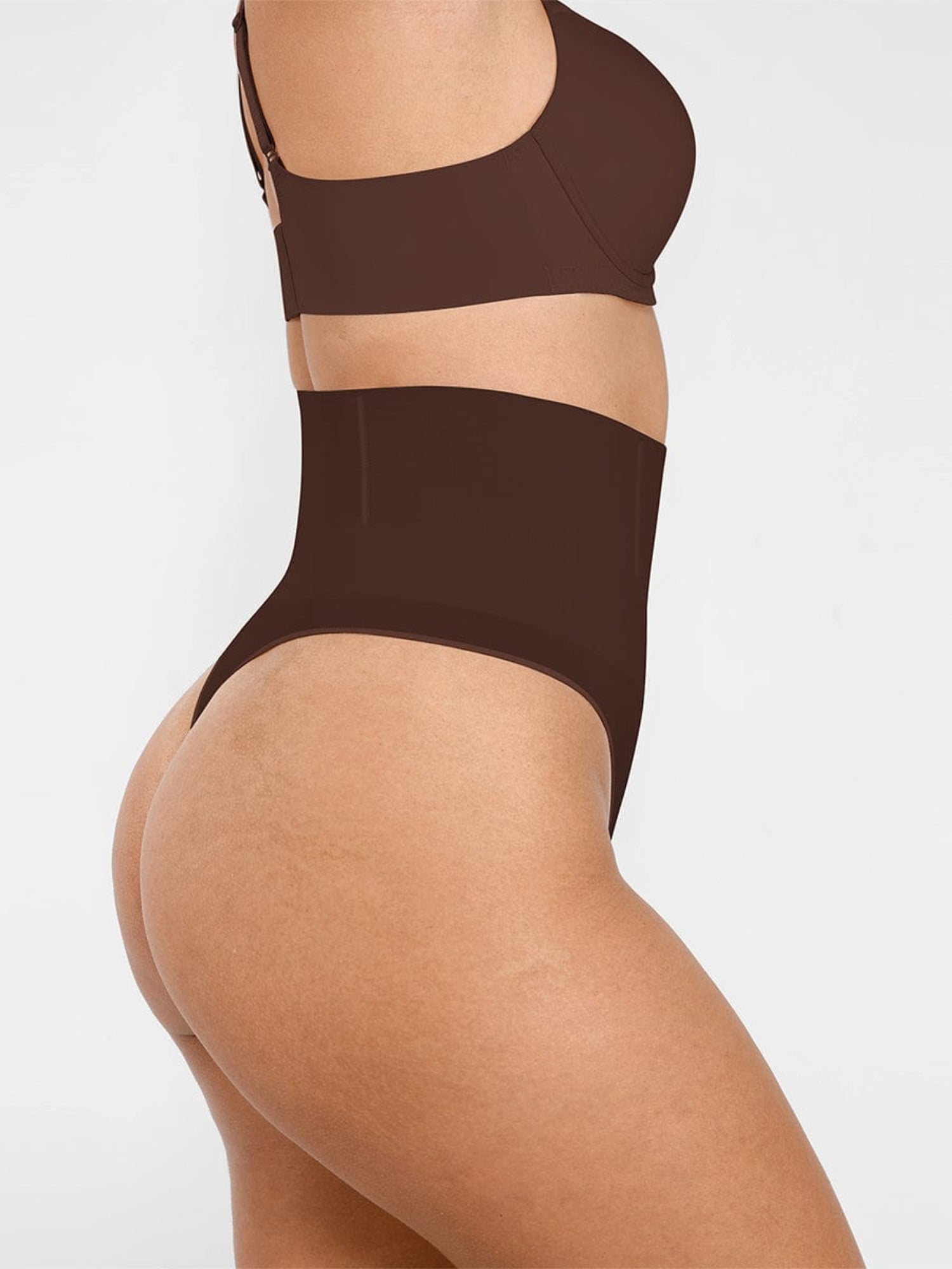 Brown swimsuit on a white background