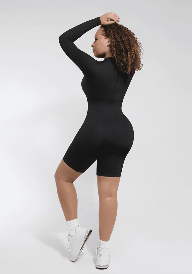 tummy control bust support jumpsuit black seamless shapewear with long sleeves and fitted body-hugging design