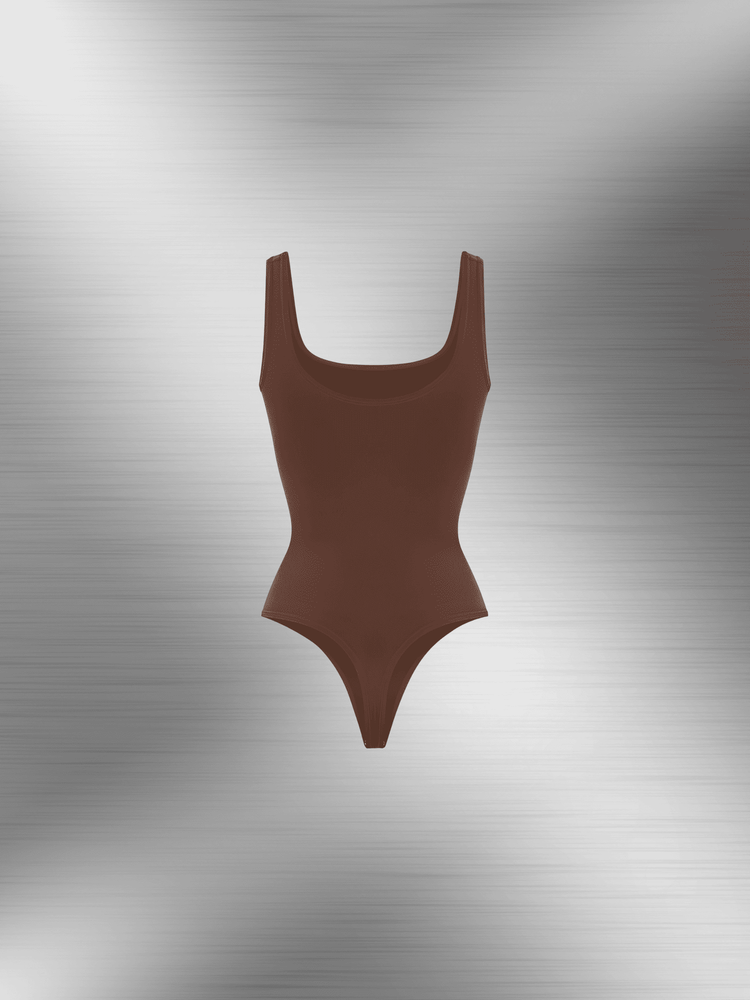 compression sculpt brief bodysuit in brown with smoothing fit and thong back for streamlined shaping