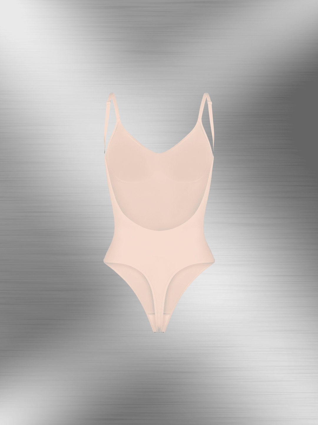 open-back bodysuit with low scoop back, adjustable straps, and tummy-smoothing fit for low-back outfits