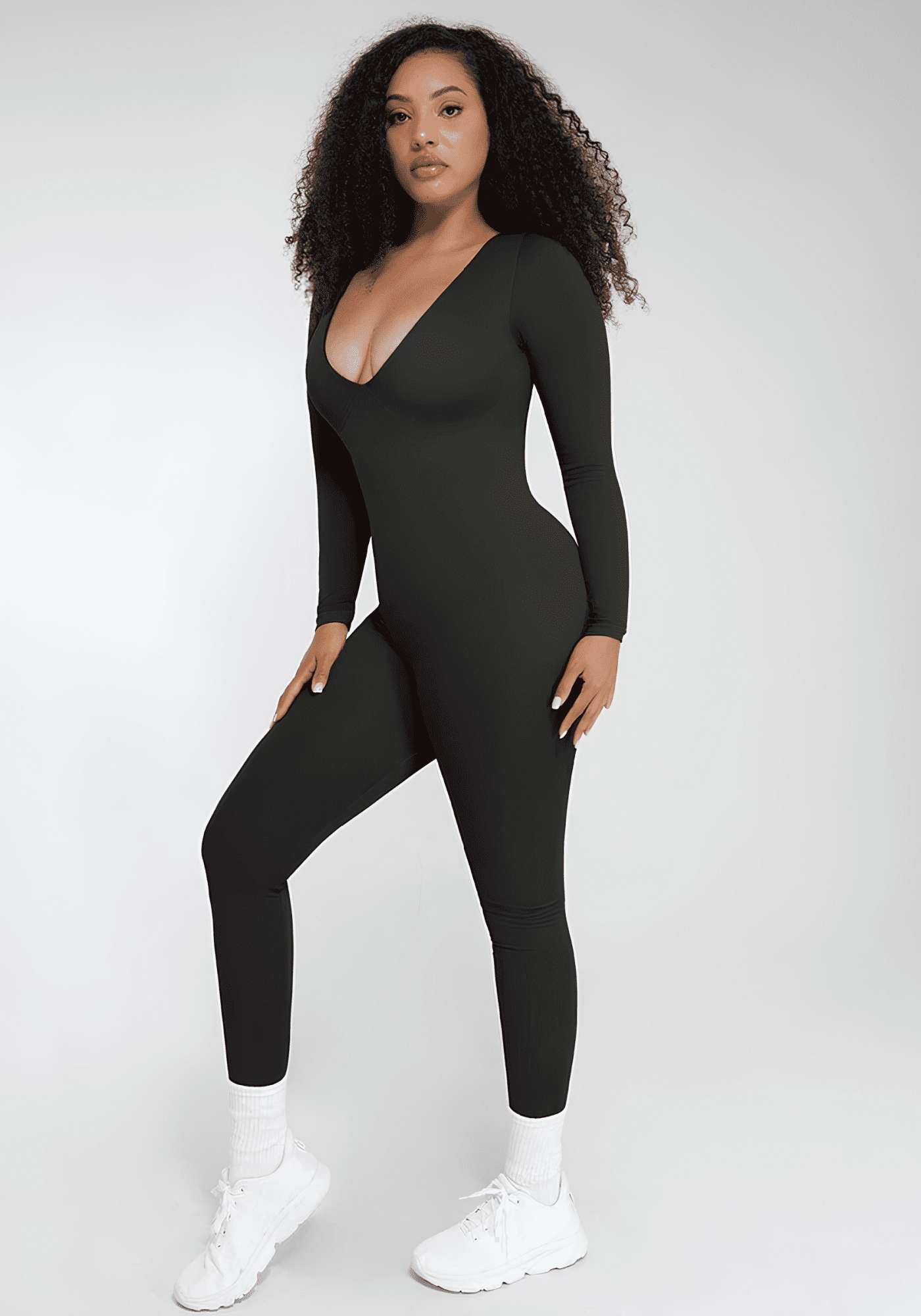 deep v tummy control catsuit black shapewear with deep V-neck and long sleeves for smooth sculpted support