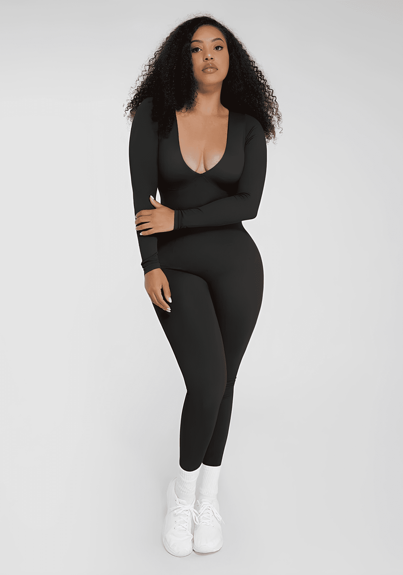 deep v tummy control catsuit black shapewear with deep V-neck, long sleeves, and sculpting fit