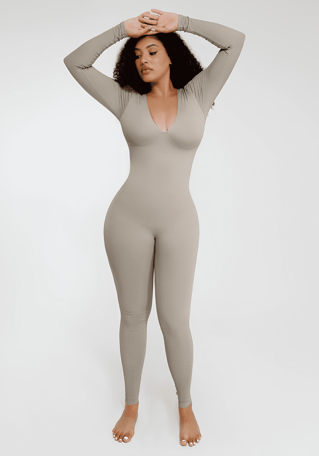 deep v tummy control catsuit shapewear with long sleeves, deep V-neck, and sculpting fit for a smooth silhouette