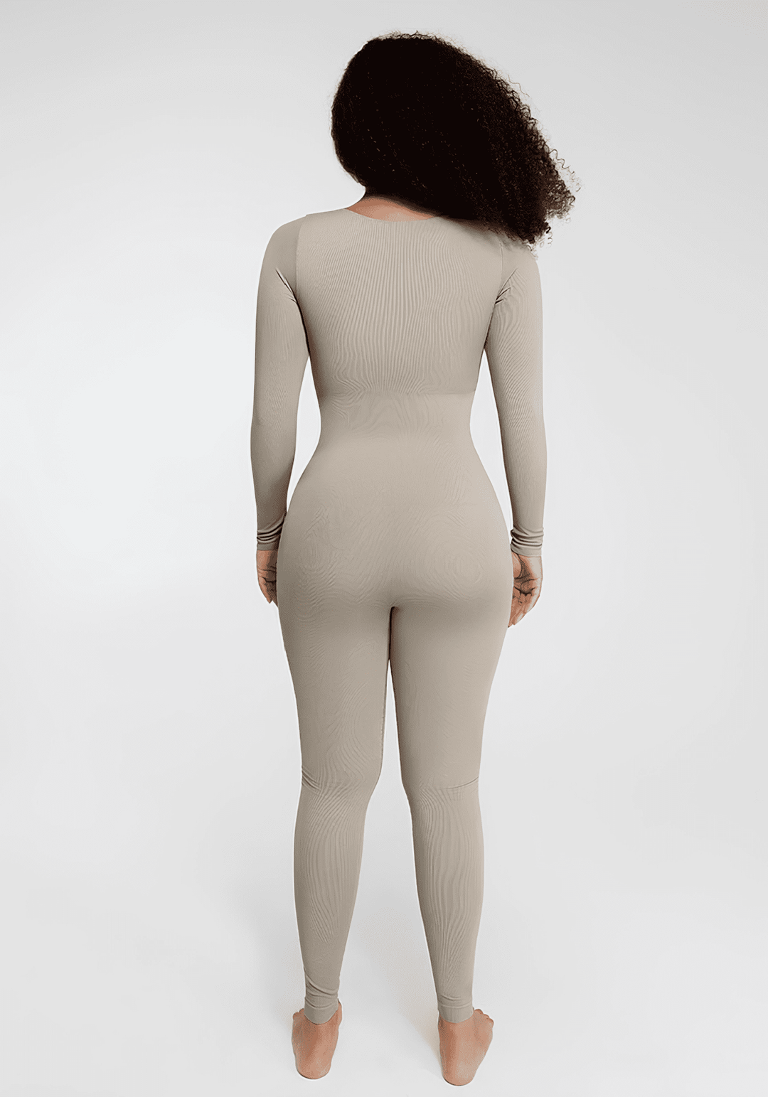 deep v tummy control catsuit with long sleeves, sculpting fit, and smooth back view for shapewear support