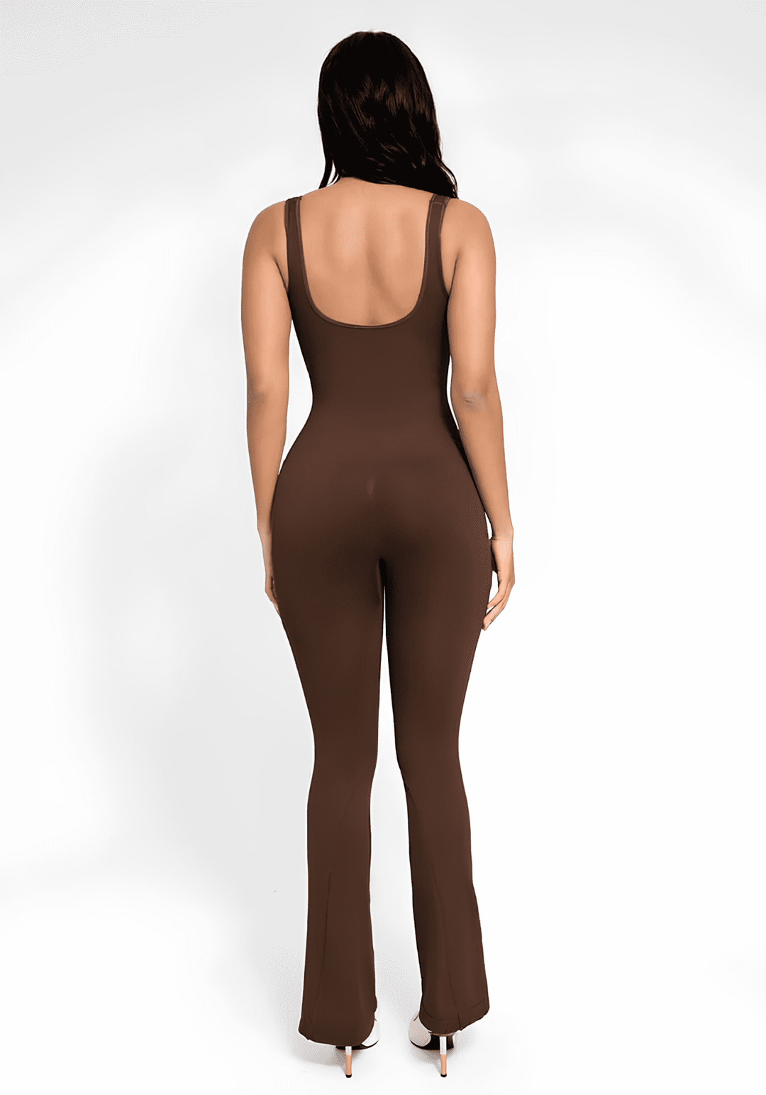 flared open back jumpsuit with square neckline and flared leg shown from back