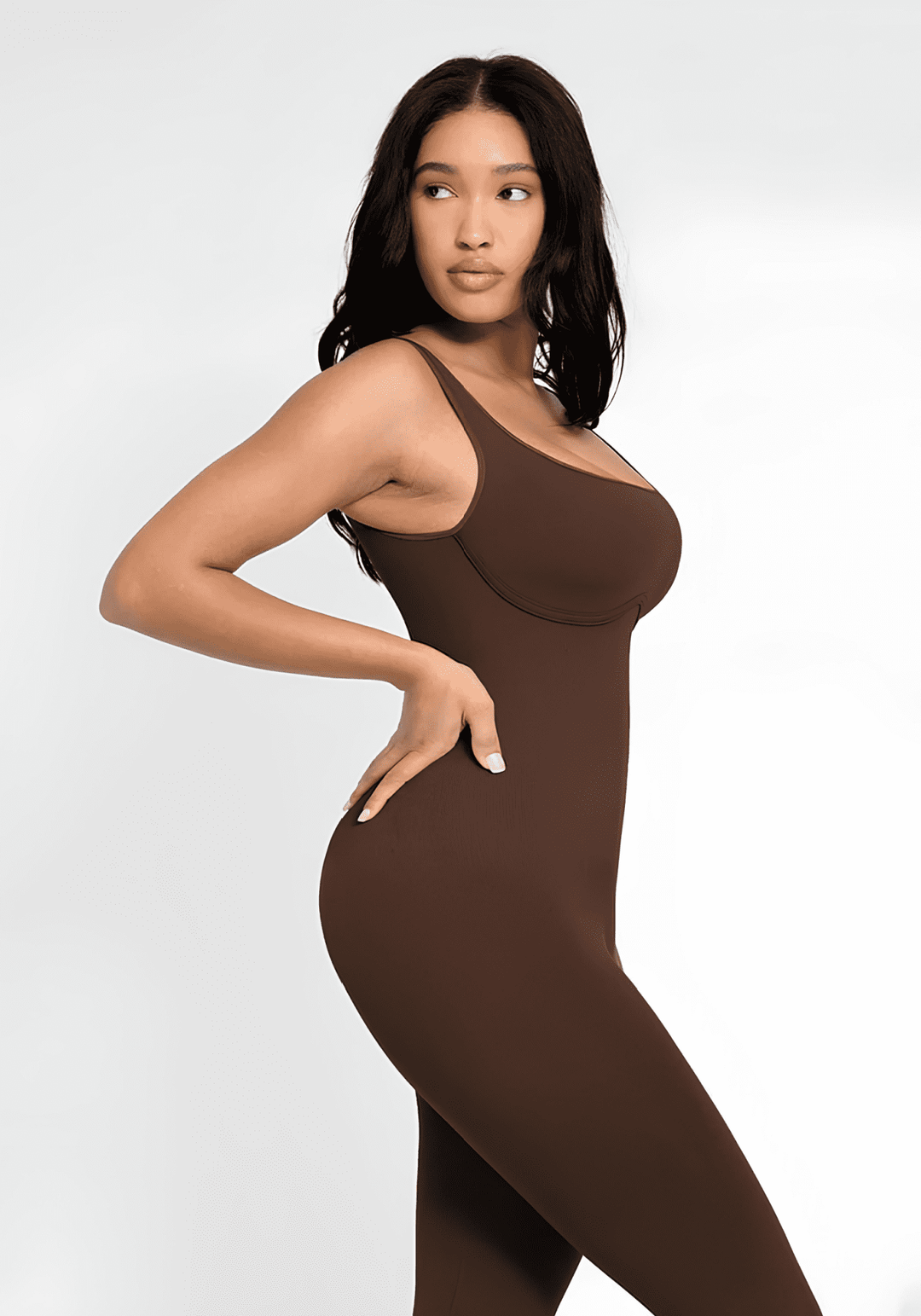 flared open back jumpsuit in brown, fitted silhouette with flared leg and square neckline for a sleek look
