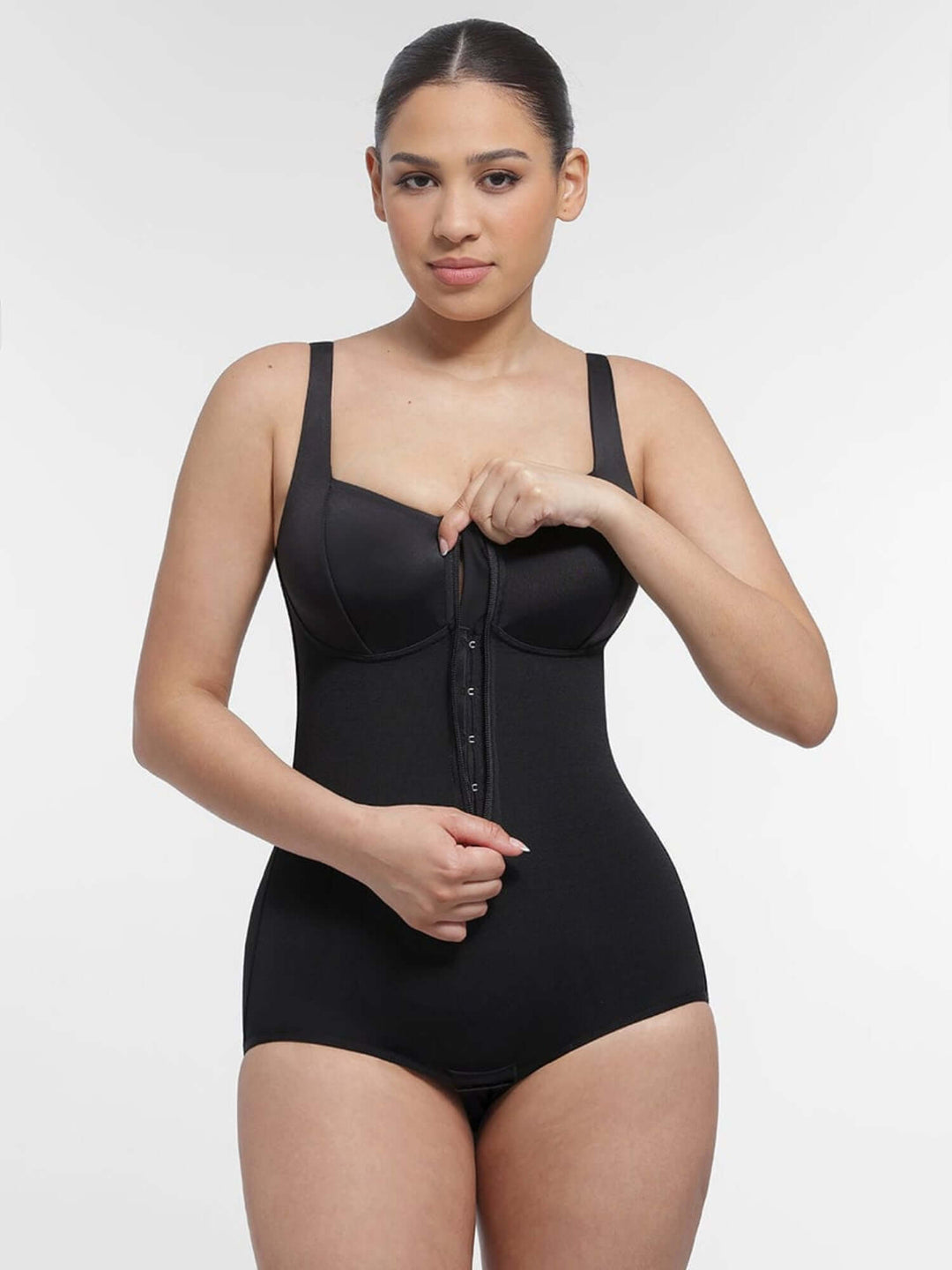full body compression shapewear black bodysuit with bust support, waist control, and front button closure for a smooth silhouette