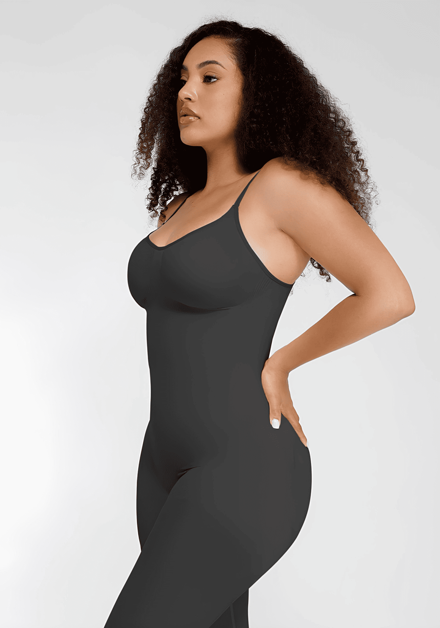 Full-length body shaper catsuit with seamless 360-degree control, bust support, and lifted rear for a smooth fit