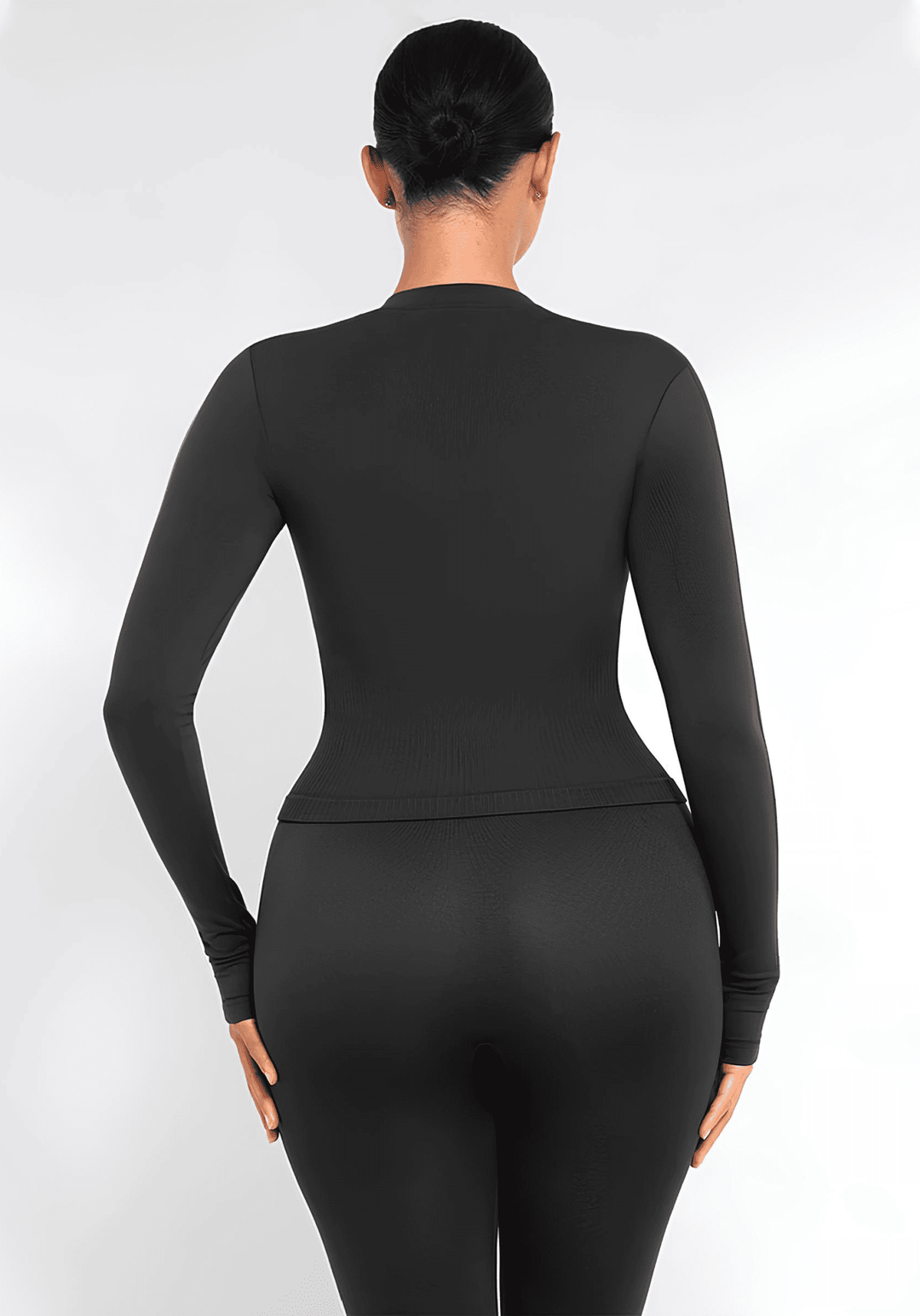full zip running top with thumb holes, seamless fitted long sleeve activewear back view