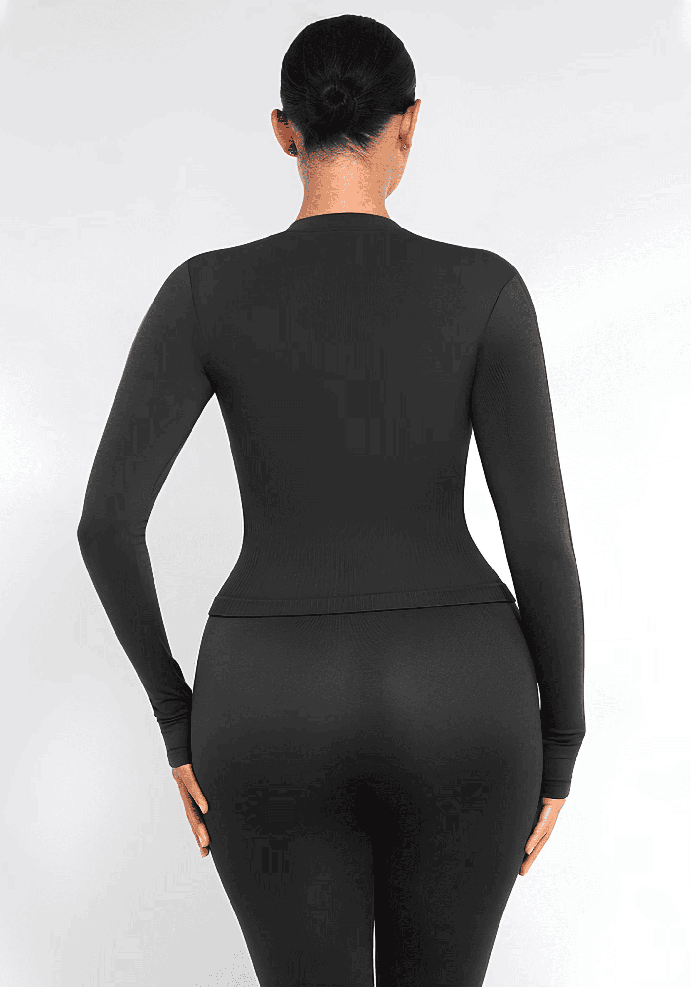 full zip running top with thumb holes, seamless fitted long sleeve activewear back view