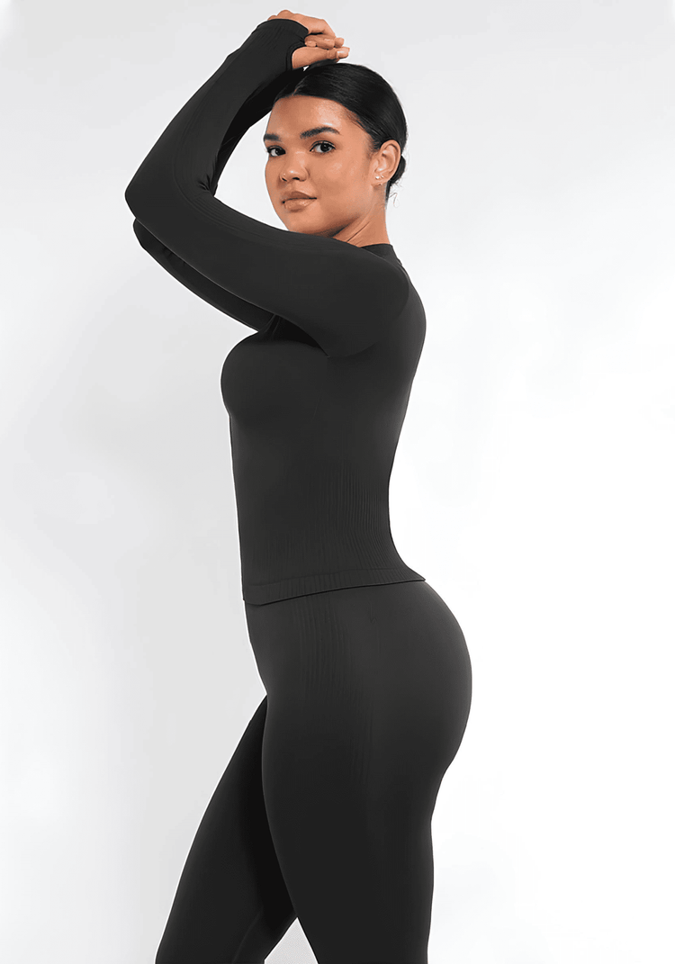 full zip running top with thumb hole technology, black seamless long sleeve athletic fit for women