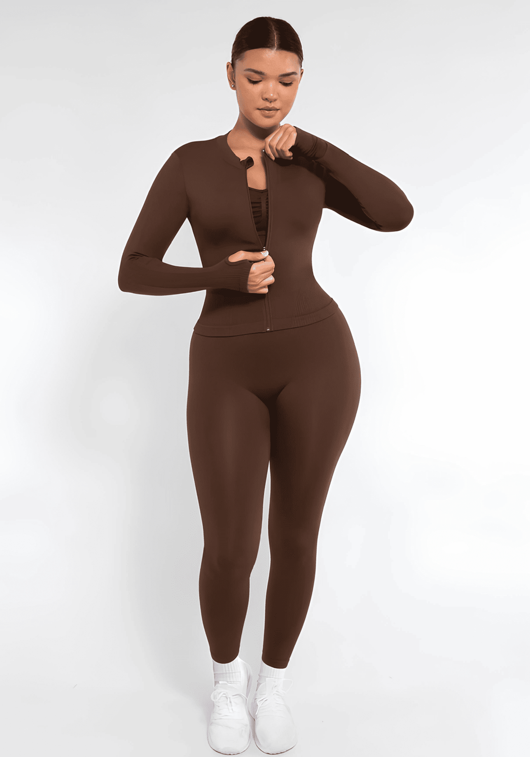 full zip running top with thumb hole technology, seamless fit and flattering compression for women’s running