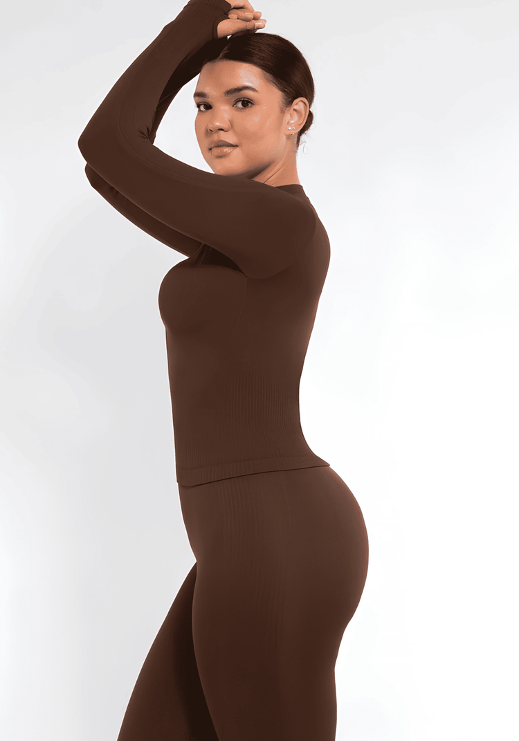 full zip running top with thumb hole technology, long sleeve seamless fit, flattering waist support, brown activewear